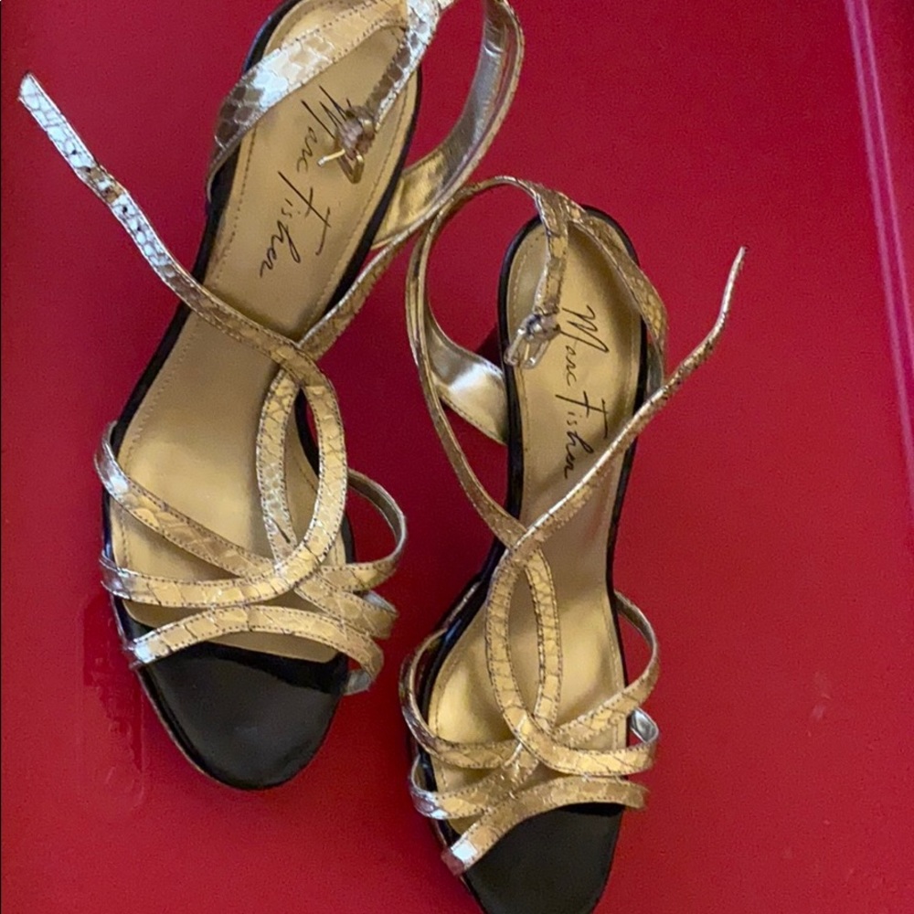Women’s Gold size 9 4 inch heels